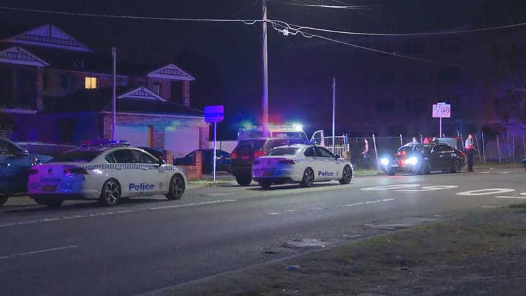 Police at the scene where a woman was arrested after allegedly stabbing a man in Sydney's Chester Hill. Authorities are investigating the incident.